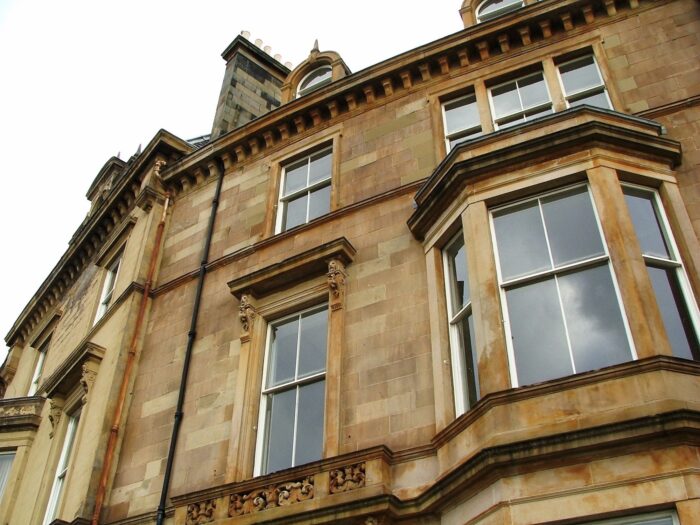 Outside view of a tenement flat with sash windows