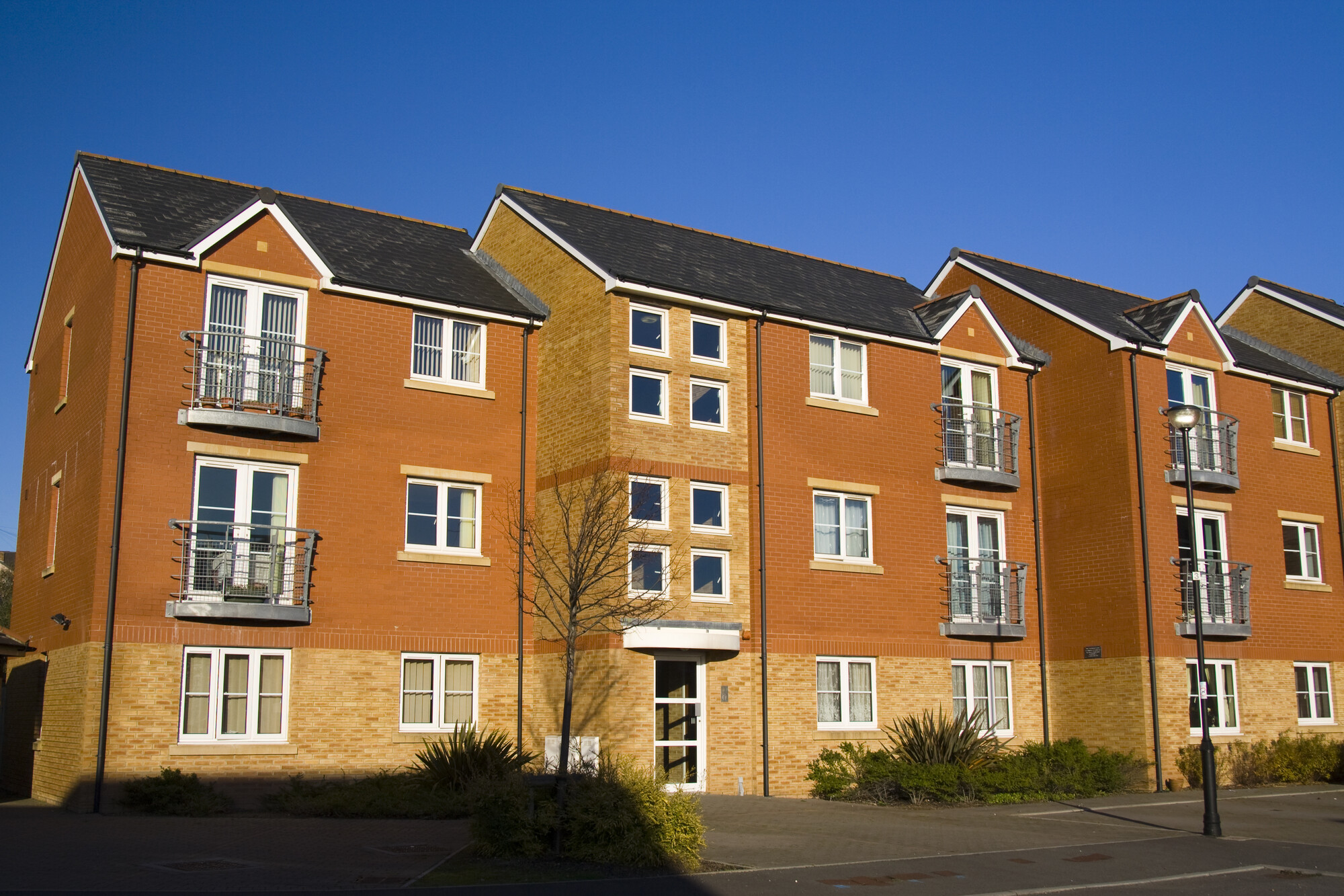 A block of flats comprised over three levels.