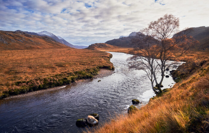 A river running through the Scottish countryside
