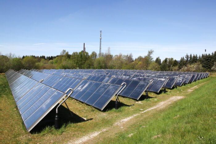 Solar panels on the ground in a field
