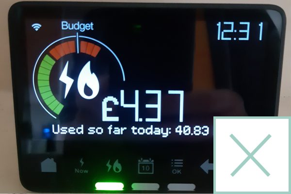 A photo of a smart meter's In Home Display with a cross in the corner