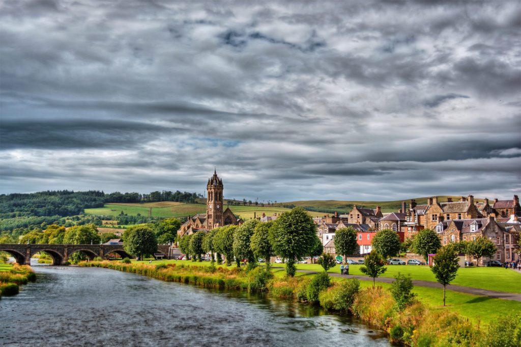 Image of houses by a river in Peebles.