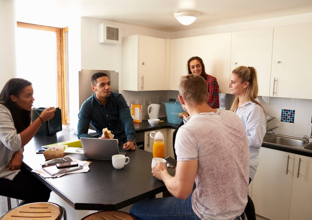 Students around a kitchen table