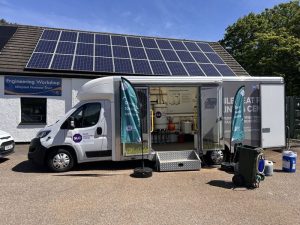 Image of the heat pump van with its side door open